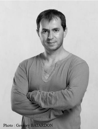 Portrait de Adrian Rusmali
